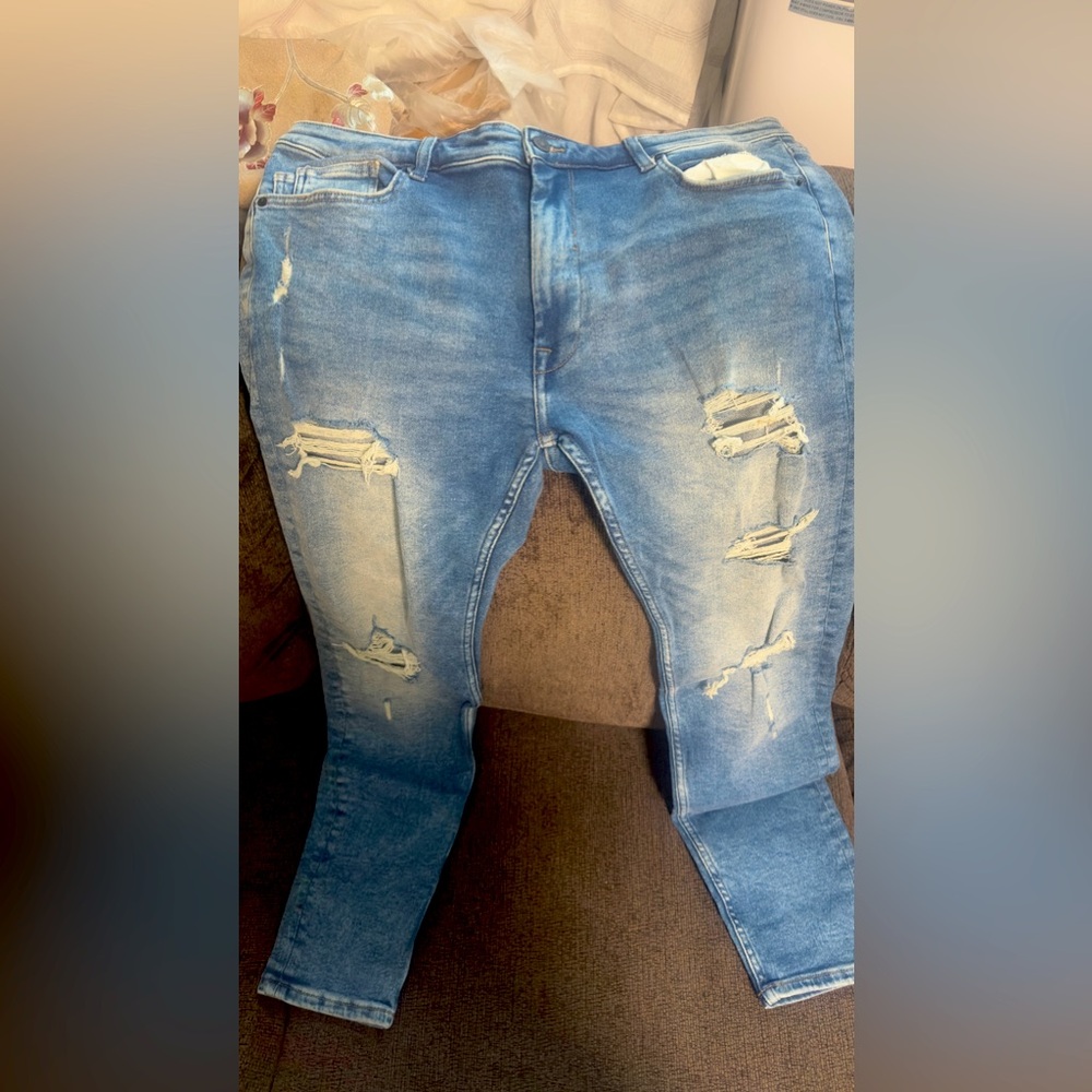 Medium wash skinny jeans by fashion nova.